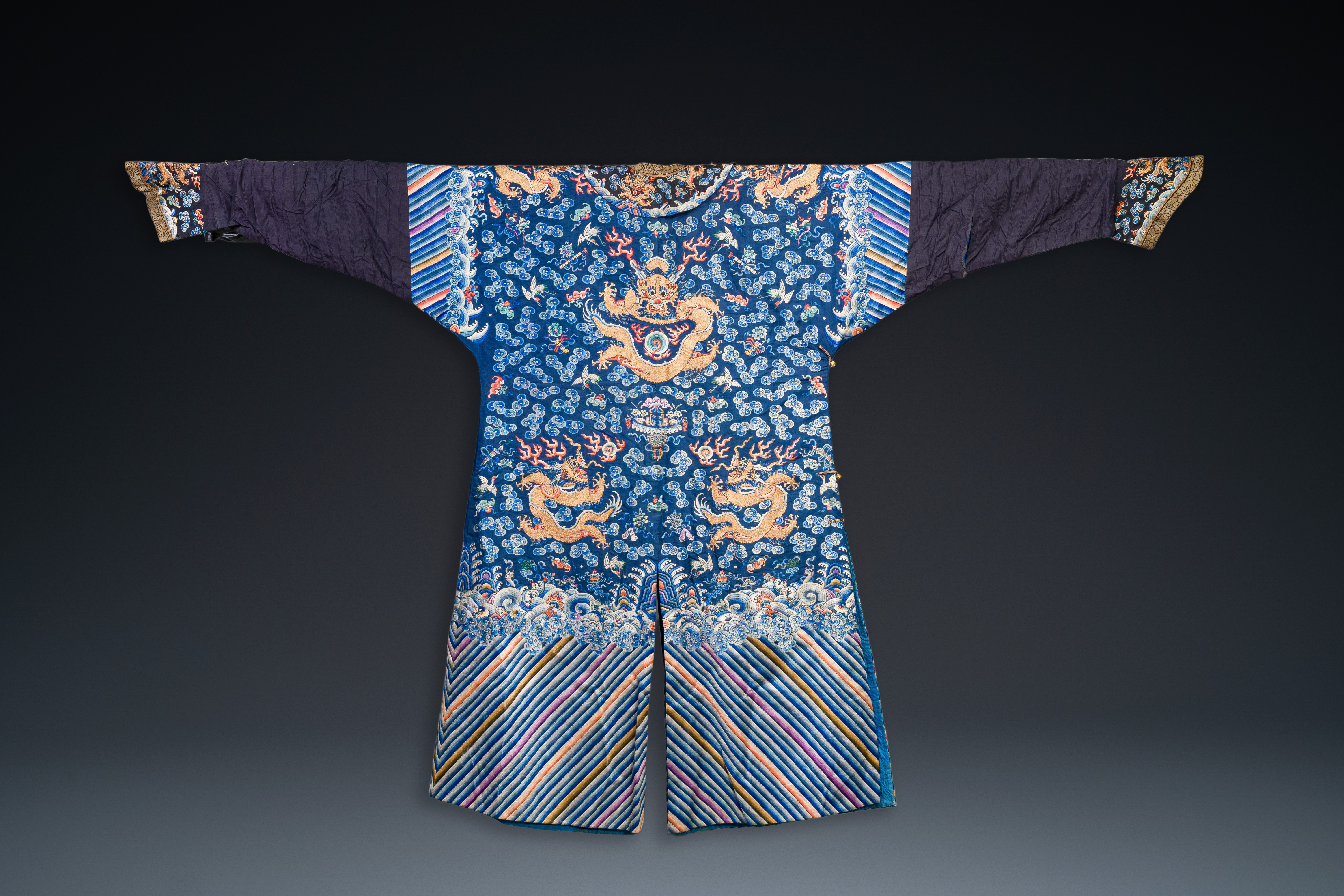 A Chinese gold thread embroidered blue-ground silk 'dragon' robe, 19th C. - Image 2 of 7