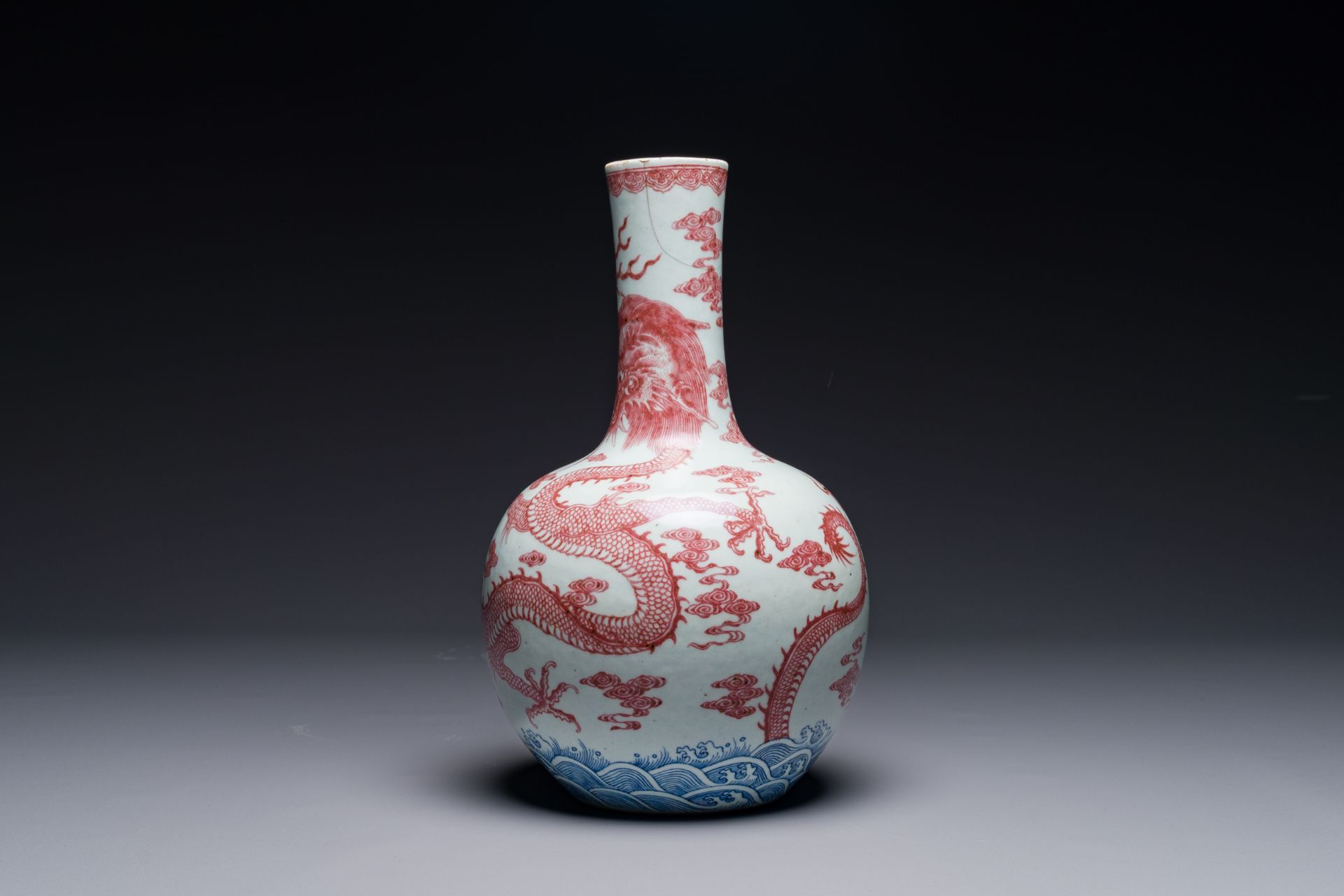 A Chinese blue, white and copper-red 'dragon' tianqiu ping' vase, 18th C. - Image 2 of 7