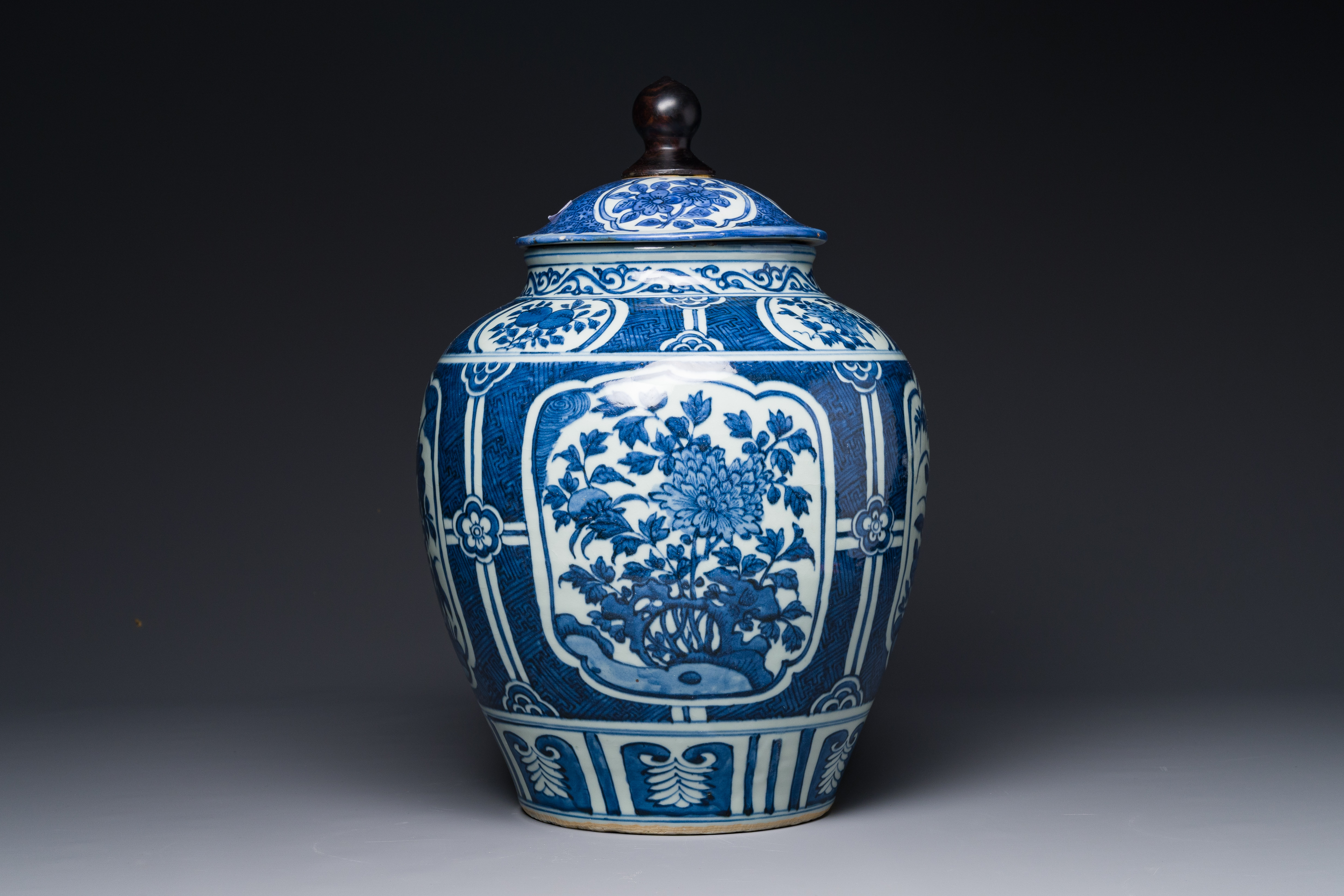 A Chinese blue and white jar and cover with floral design, Wanli