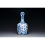 A Dutch blue and white chinoiserie bottle vase, Delft or Haarlem, 1st half 17th C.