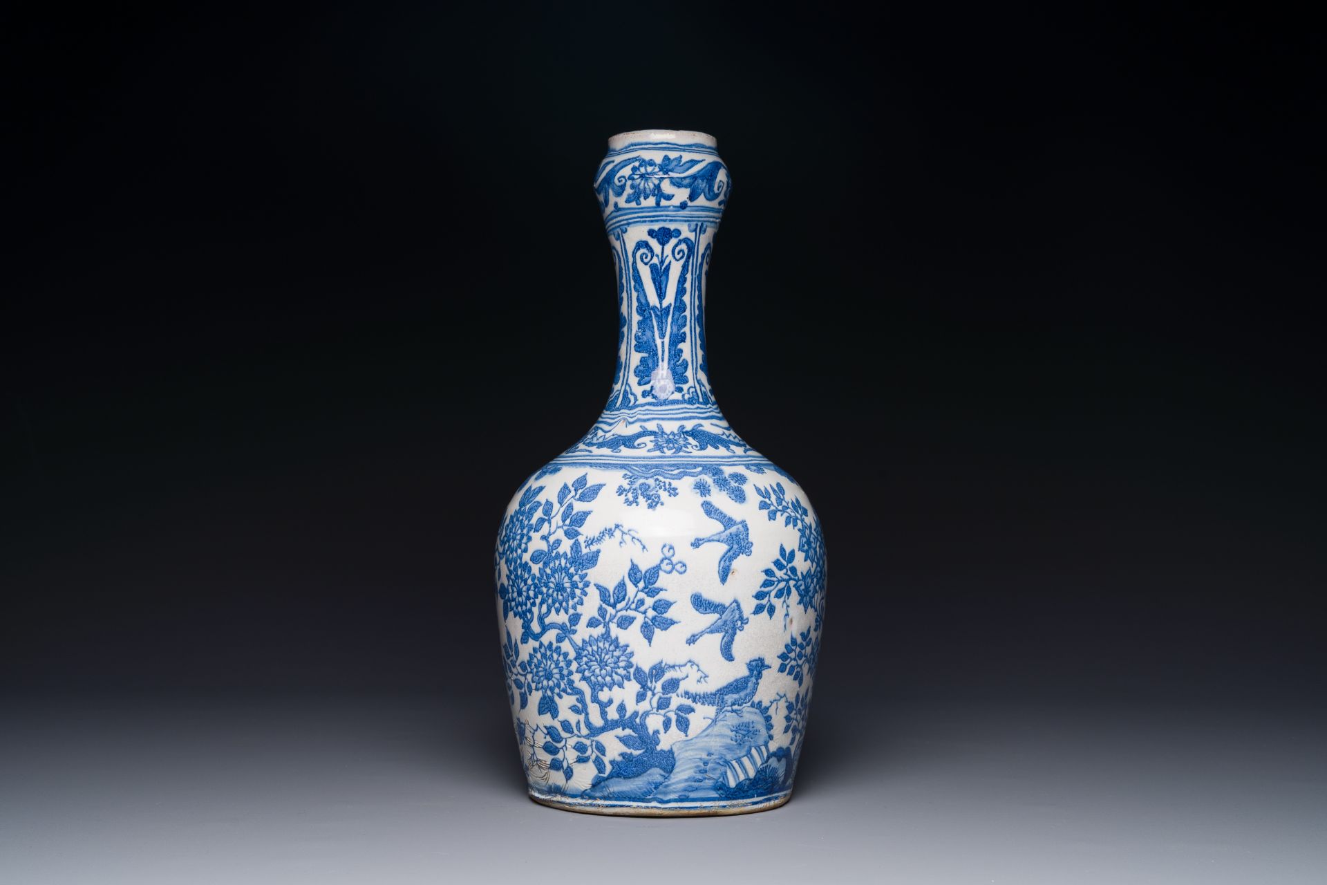 A Dutch blue and white chinoiserie bottle vase, Delft or Haarlem, 1st half 17th C.