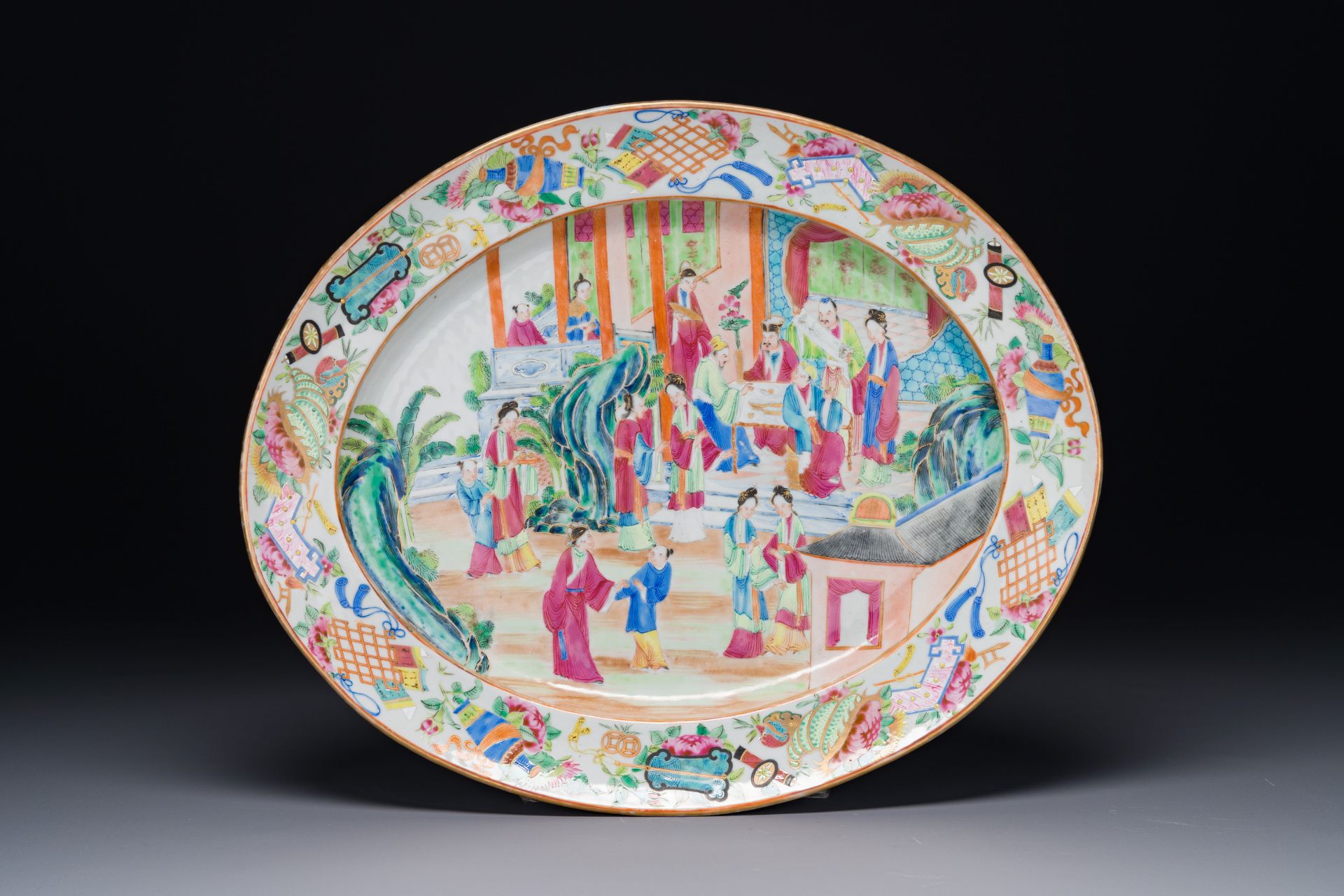 An ovale Chinese Canton famille rose dish with narrative design, 19th C.