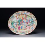 An ovale Chinese Canton famille rose dish with narrative design, 19th C.