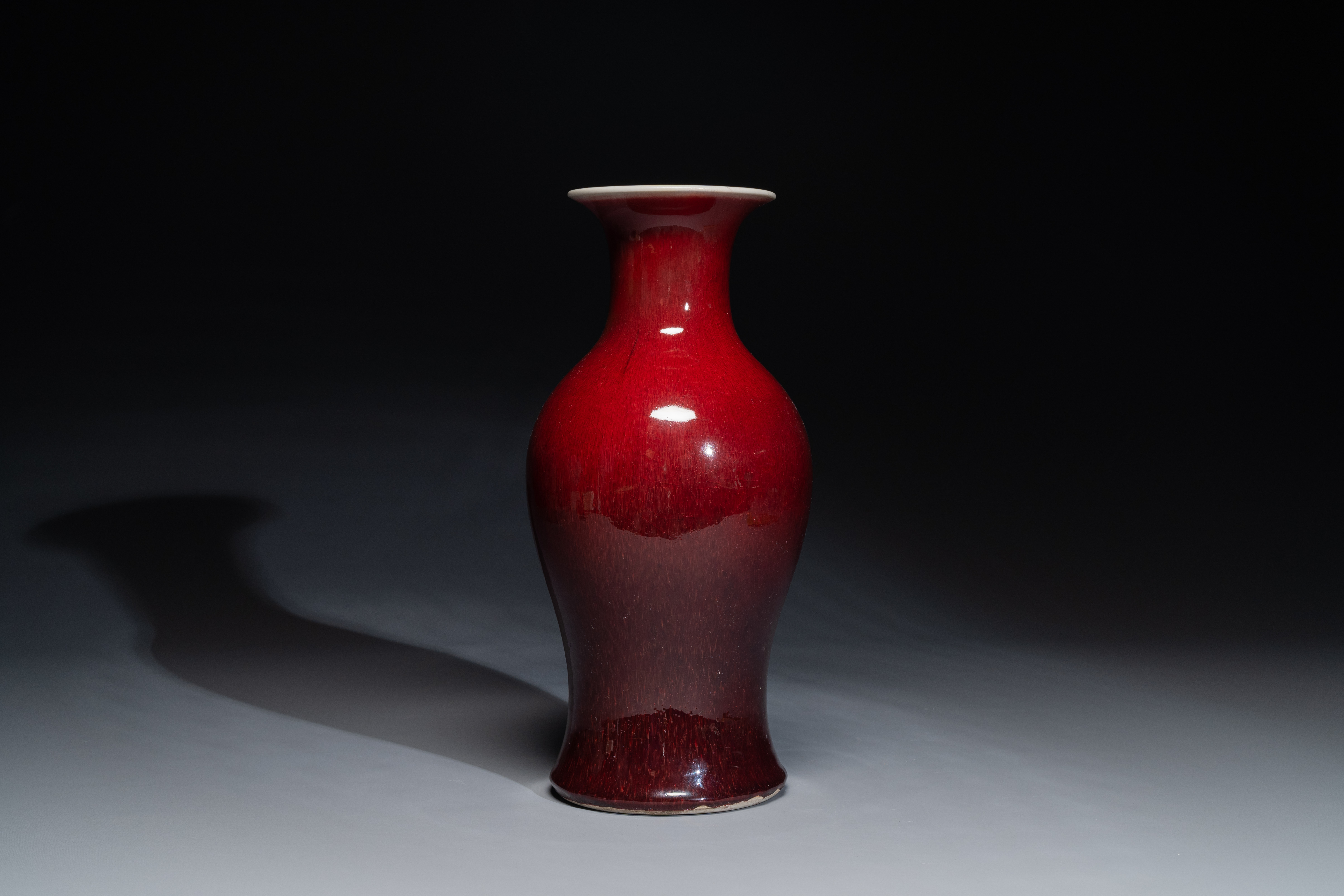 A Chinese monochrome copper-red-glazed vase, 19th C.