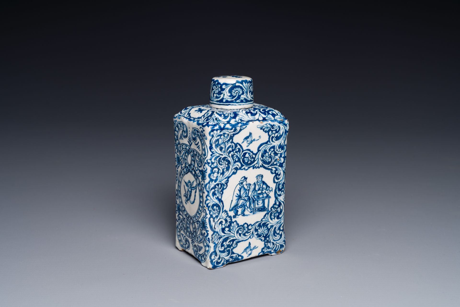 A rectangular Dutch Delft blue and white teacaddy and cover, 18th C.