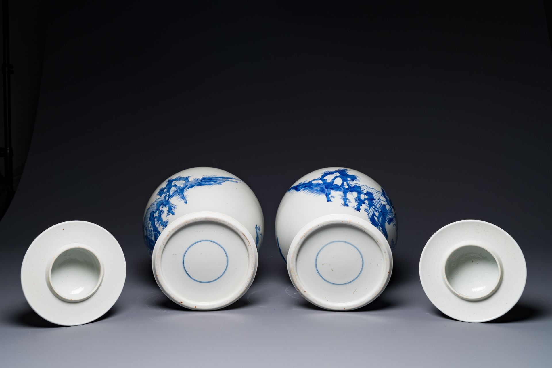 A pair of Chinese blue and white covered vases with figural design, 19th C. - Image 5 of 5