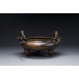 A large Chinese bronze tripod censer with 'chilong' handles, Qing Qian Gong æ¸…ä¹¾å®® mark, 18th C.