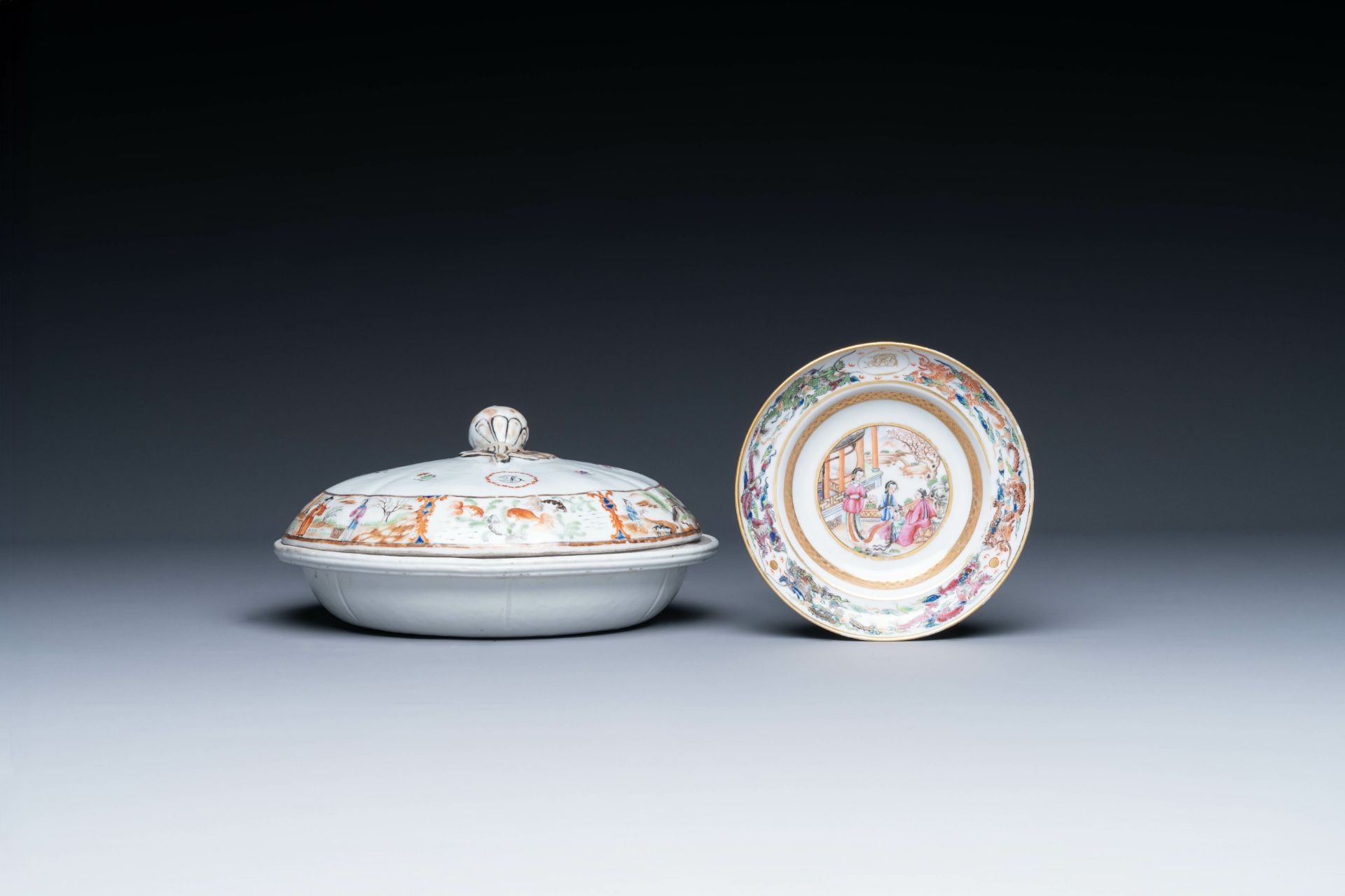 A Chinese Canton famille rose tureen with two compartments and a monogrammed plate, 19th C.