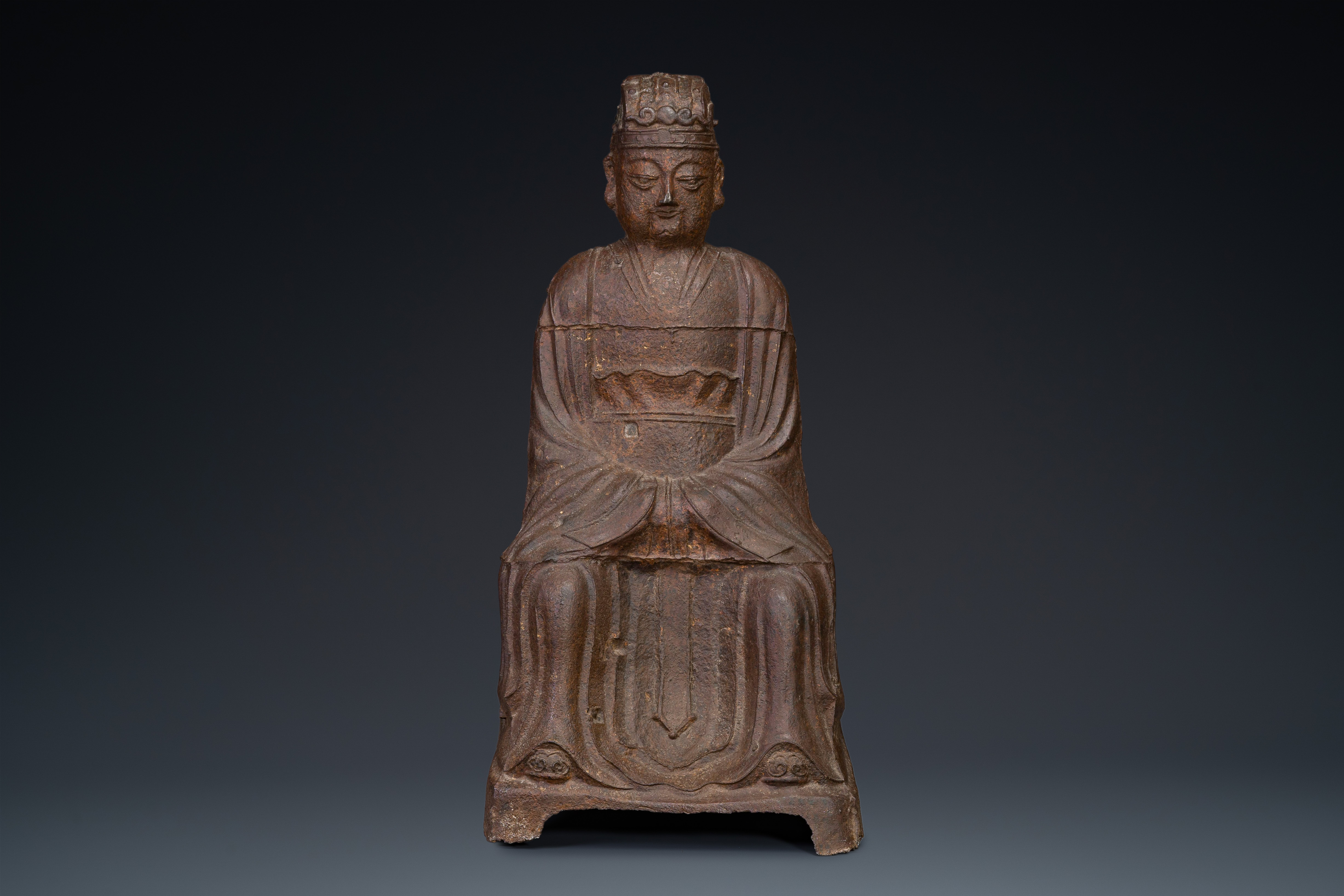 A Chinese cast iron figure of a dignitary, dated 1722