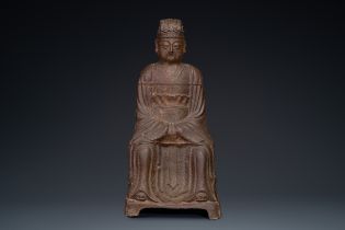 A Chinese cast iron figure of a dignitary, dated 1722