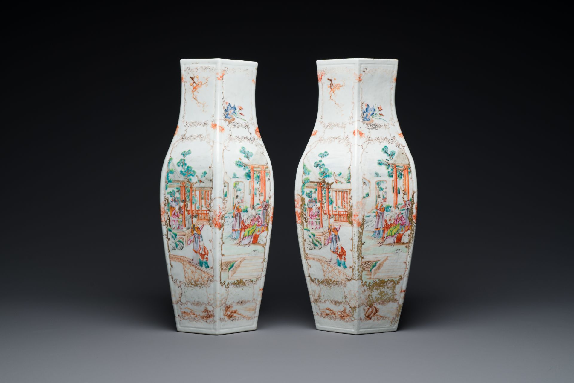 A pair of Chinese hexagonal Canton famille rose 'mandarin subject' vases, Qianlong - Image 4 of 6