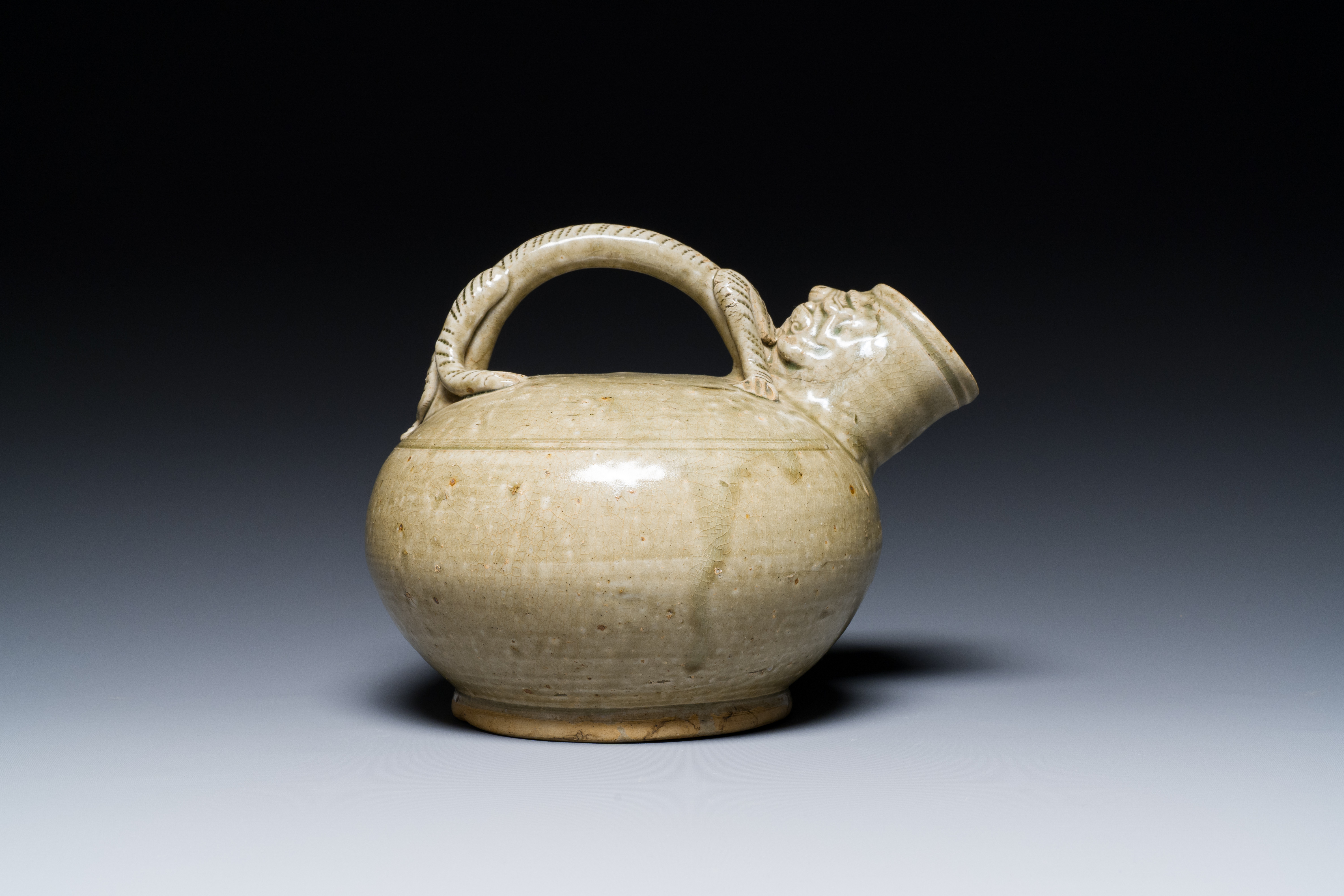 A Chinese monochrome Yaozhou kiln ewer, Tang or later - Image 4 of 7