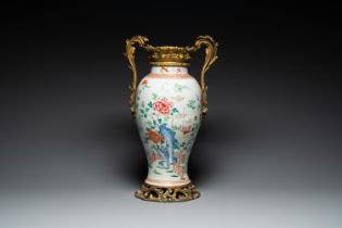 A Chinese famille rose vase with gilt bronze mounts, Qianlong