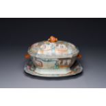 A Chinese Canton famille rose 'mandarin subject' tureen, cover and stand, Qianlong