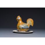A German polychrome faience rooster-shaped tureen and cover, Abtsbessingen, 18th C.