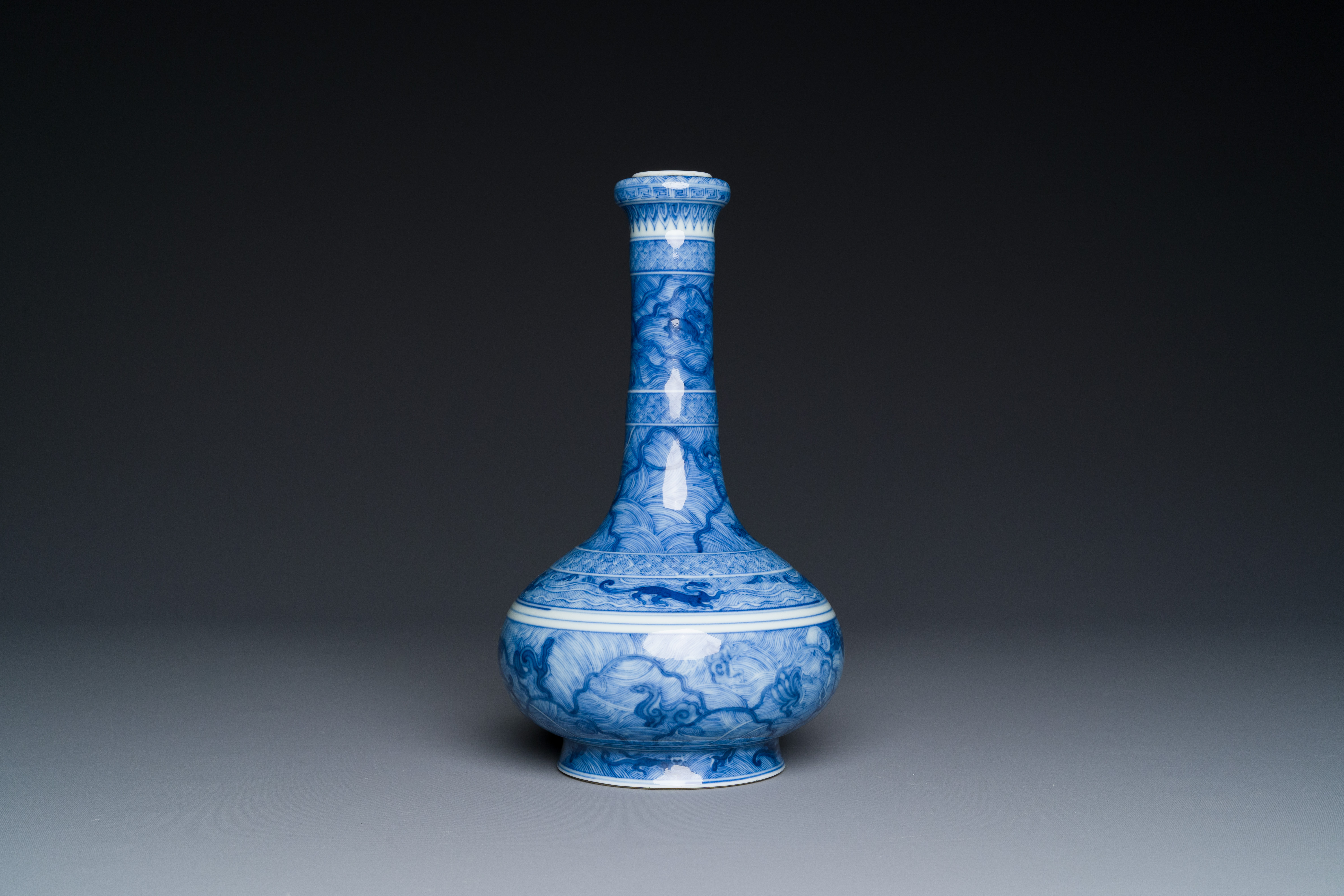 An exceptional Chinese blue and white 'mythic animals' garlic-mouth bottle vase on wooden stand, Kan - Image 4 of 10