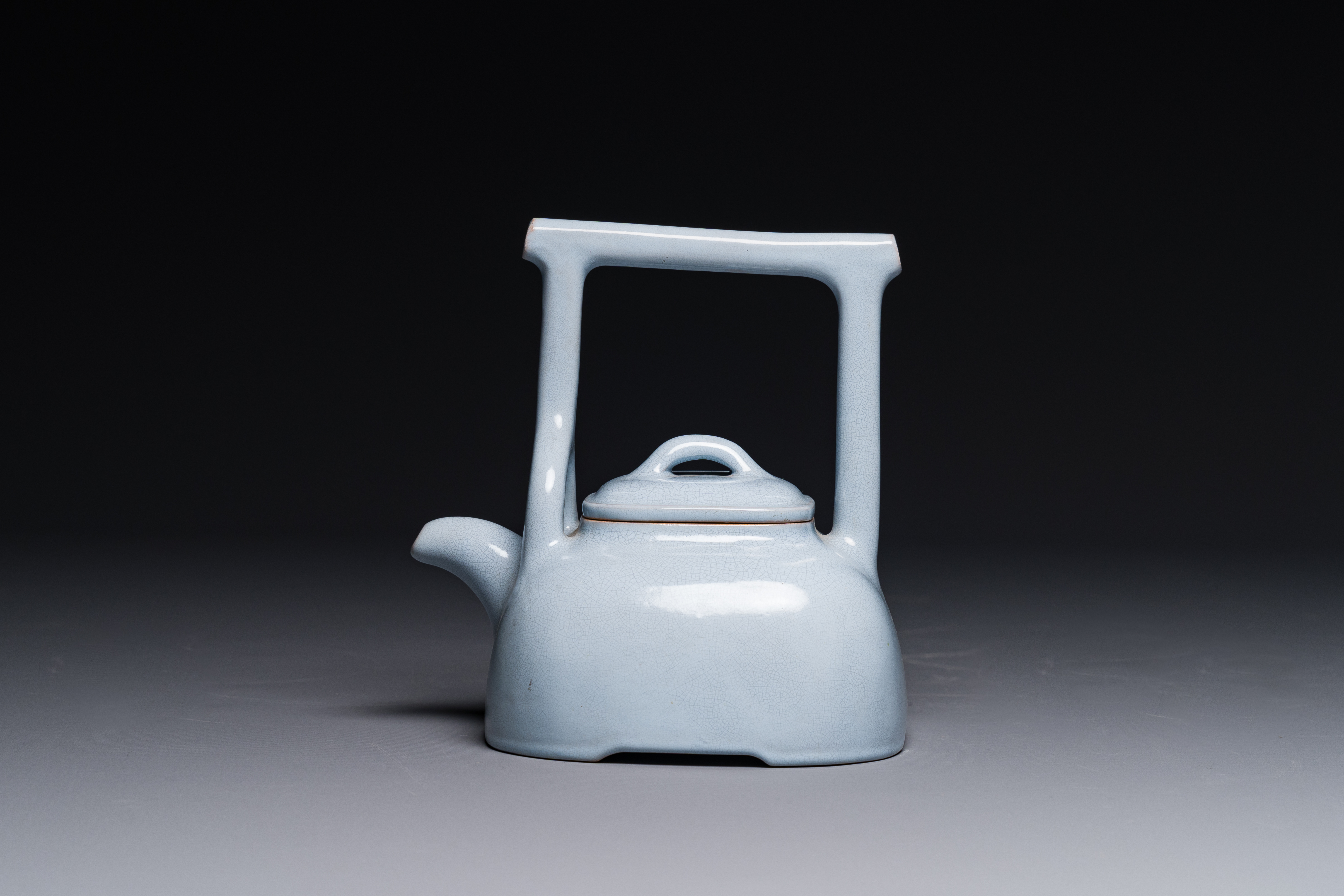 A Chinese monochrome clair-de-lune-glazed Yixing stoneware teapot and cover, Yixing seal mark, Repub