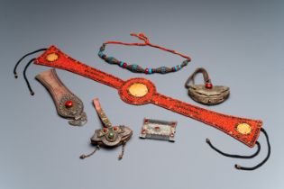 A group of six Tibetan objects of metals and textiles with gem stones and, 19th C.