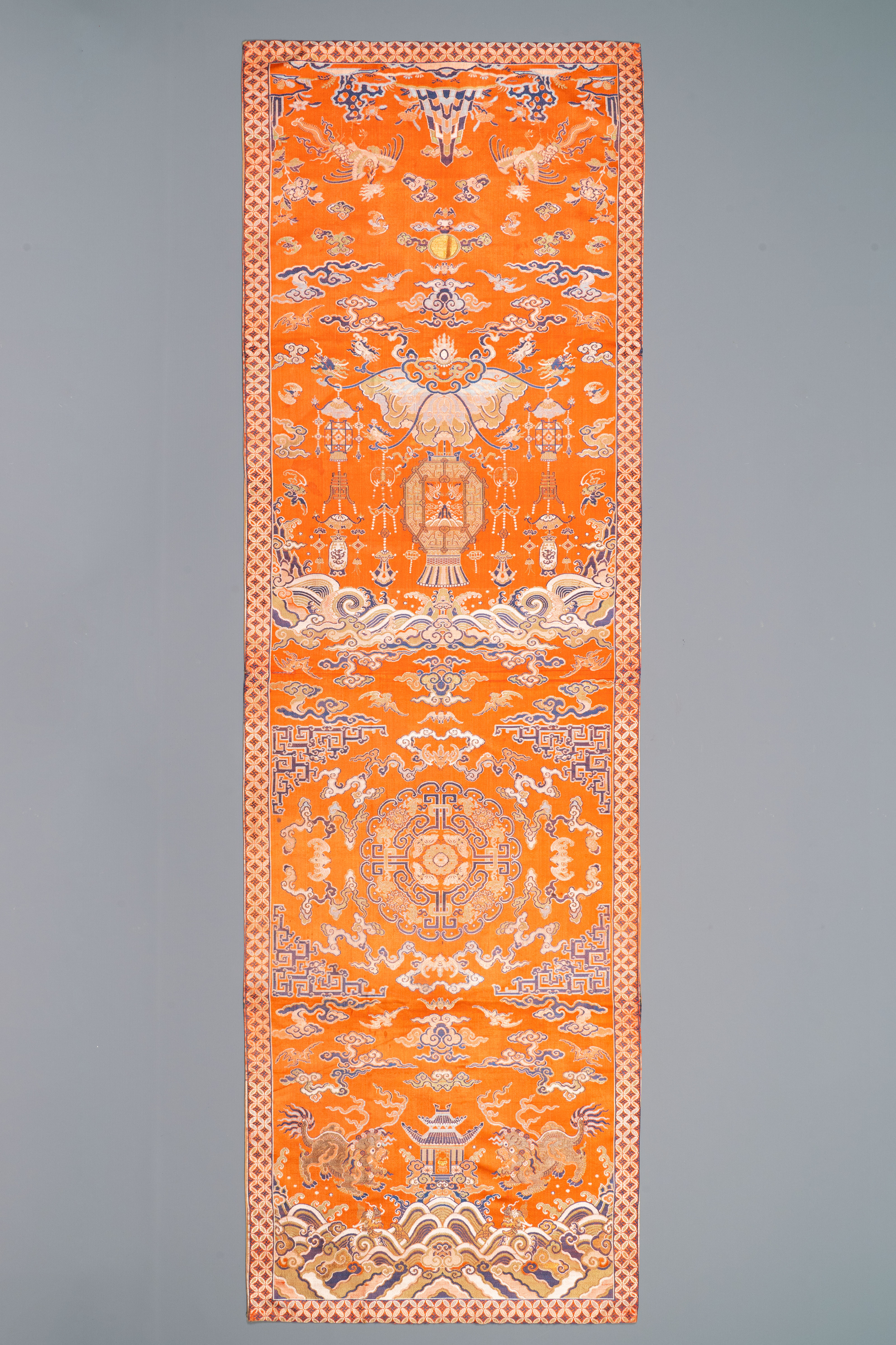 A Chinese embroidered silk 'kesi' cloth with Buddhist lions and phoenixes, 19th C.