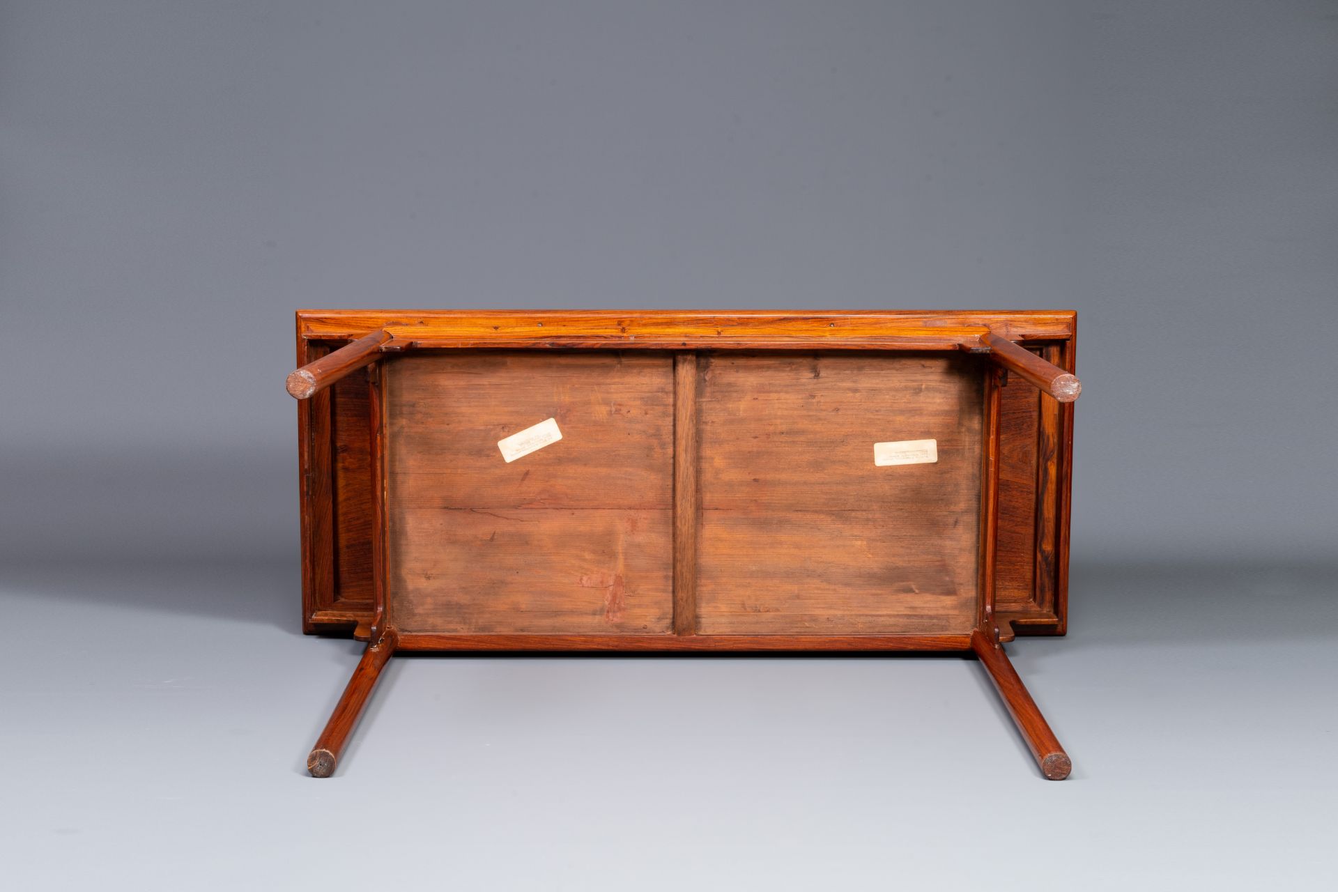 A Chinese huanghuali wooden two-drawer recessed-leg table, 19/20th C. - Image 7 of 13