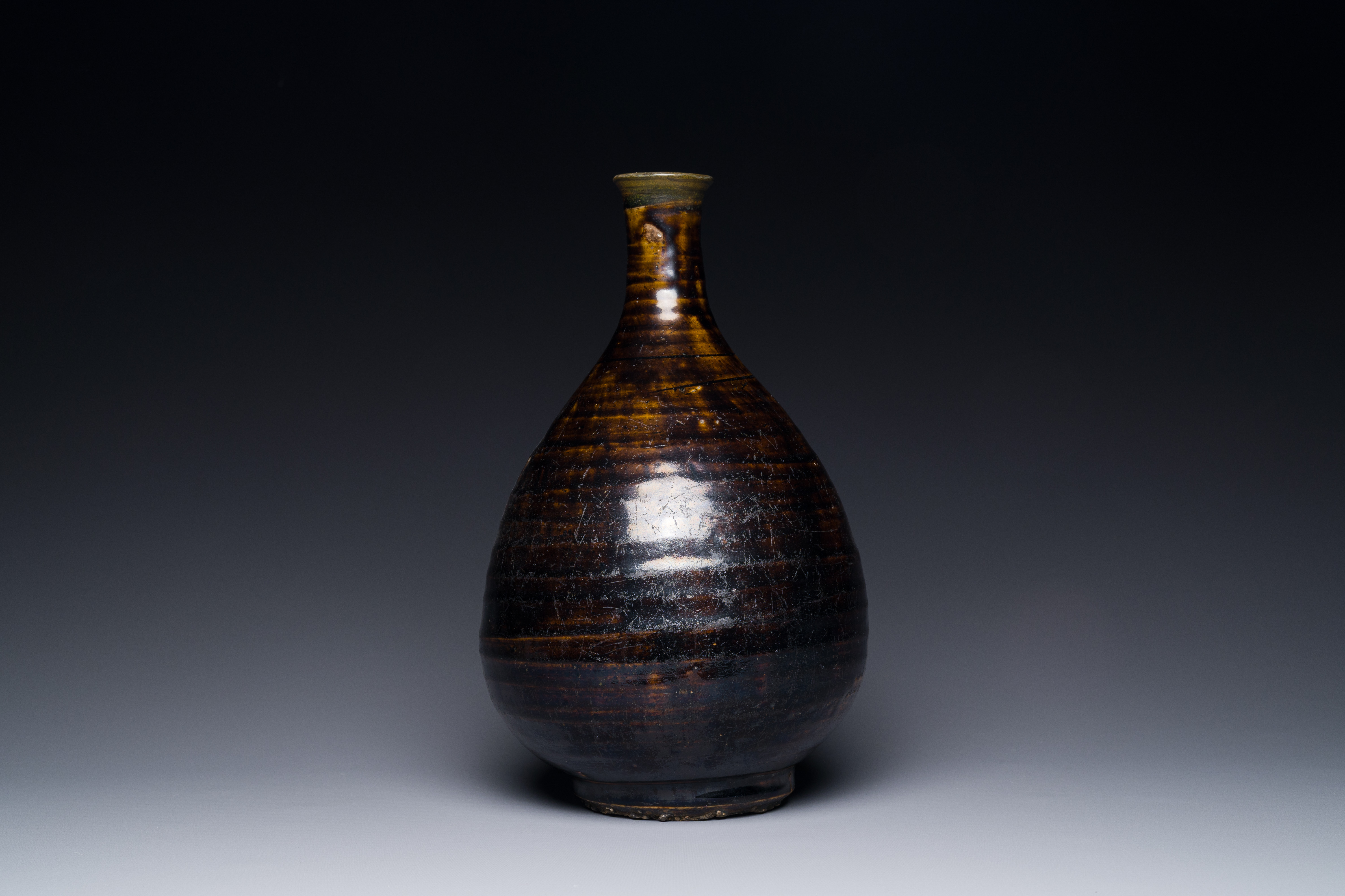 A Korean monochrome brown-glazed bottle vase, Goryeo, 15/16th C. - Image 2 of 3