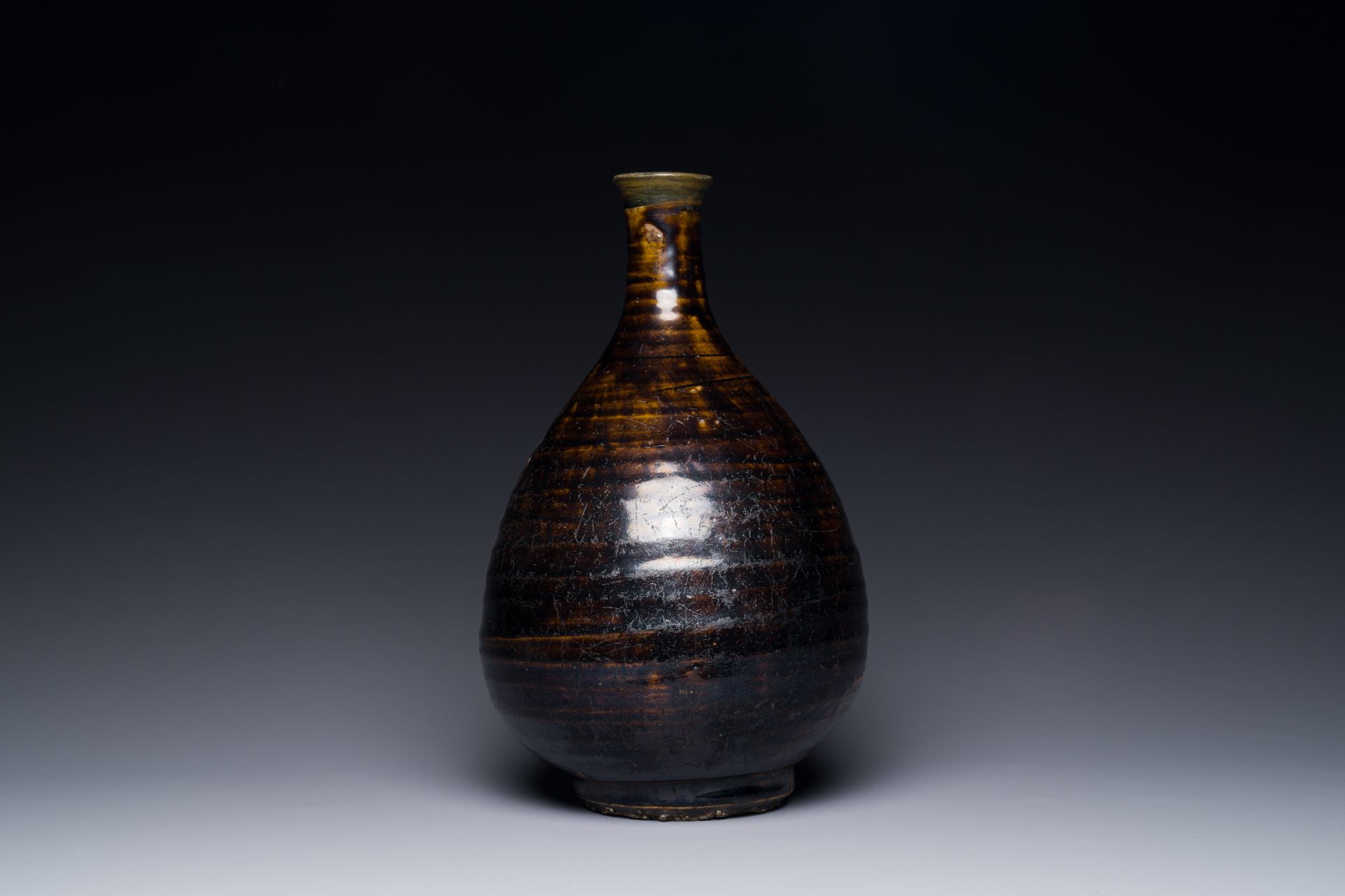 A Korean monochrome brown-glazed bottle vase, Goryeo, 15/16th C. - Image 2 of 3