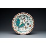 An exceptional polychrome Iznik pottery 'peacock' dish, Turkey, last quarter 16th C.