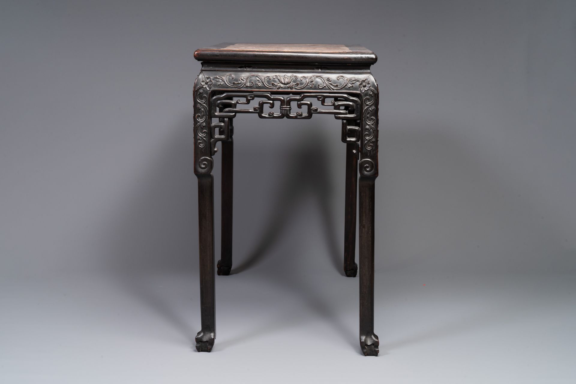 A rectangular Chinese carved wooden console table with a pink marble top, 19th C. - Image 3 of 5