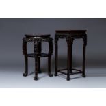 Two Chinese carved wooden stands with marble tops, 19th C.