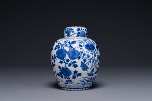 A Chinese blue and white jar and cover with floral design, Kangxi