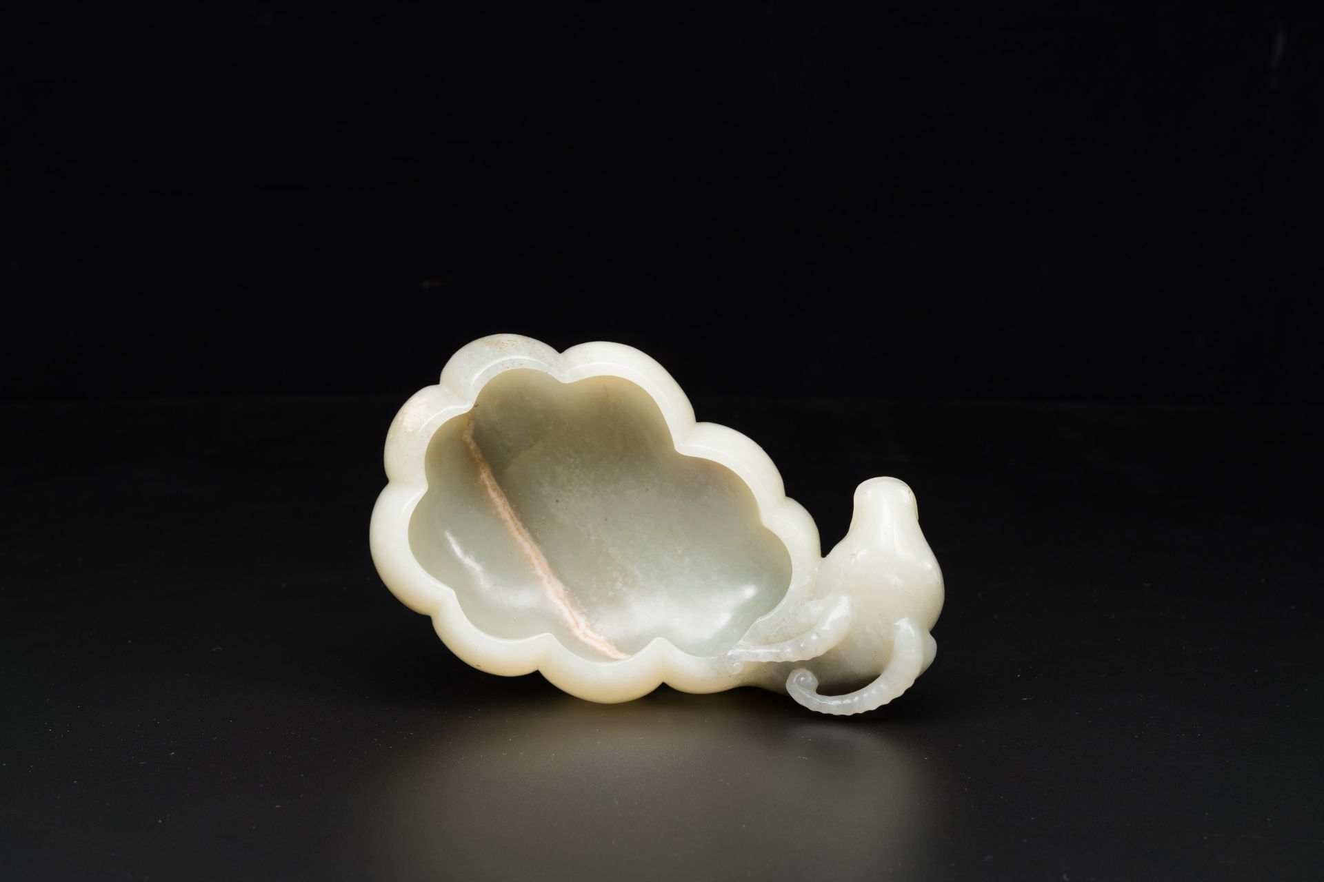 A Chinese celadon jade flower-shaped brush washer with ram's head, 17th C. - Image 8 of 9