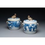 A pair of Chinese blue and white drum-shaped jars and cover, Jiajing mark, Kangxi