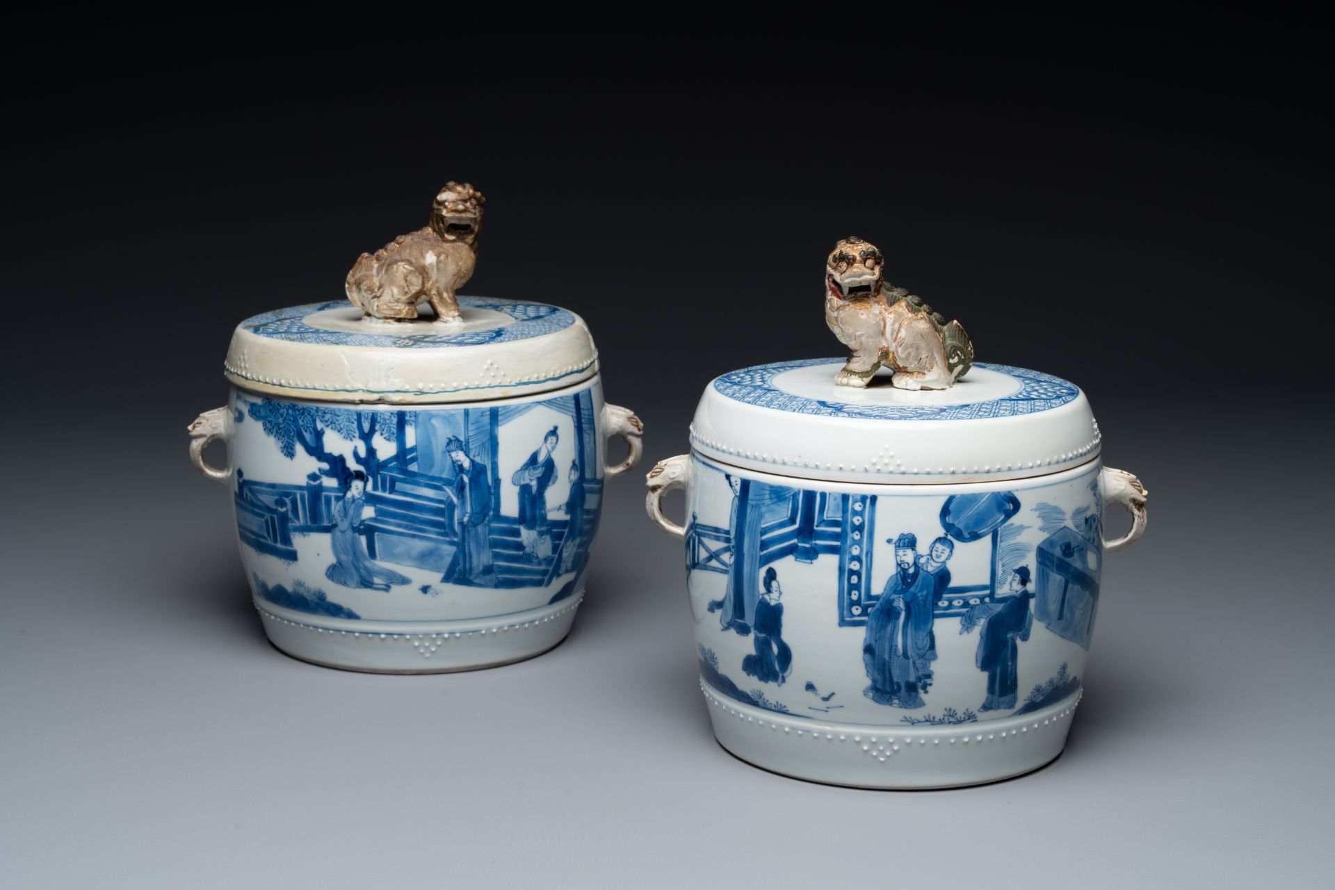 A pair of Chinese blue and white drum-shaped jars and cover, Jiajing mark, Kangxi