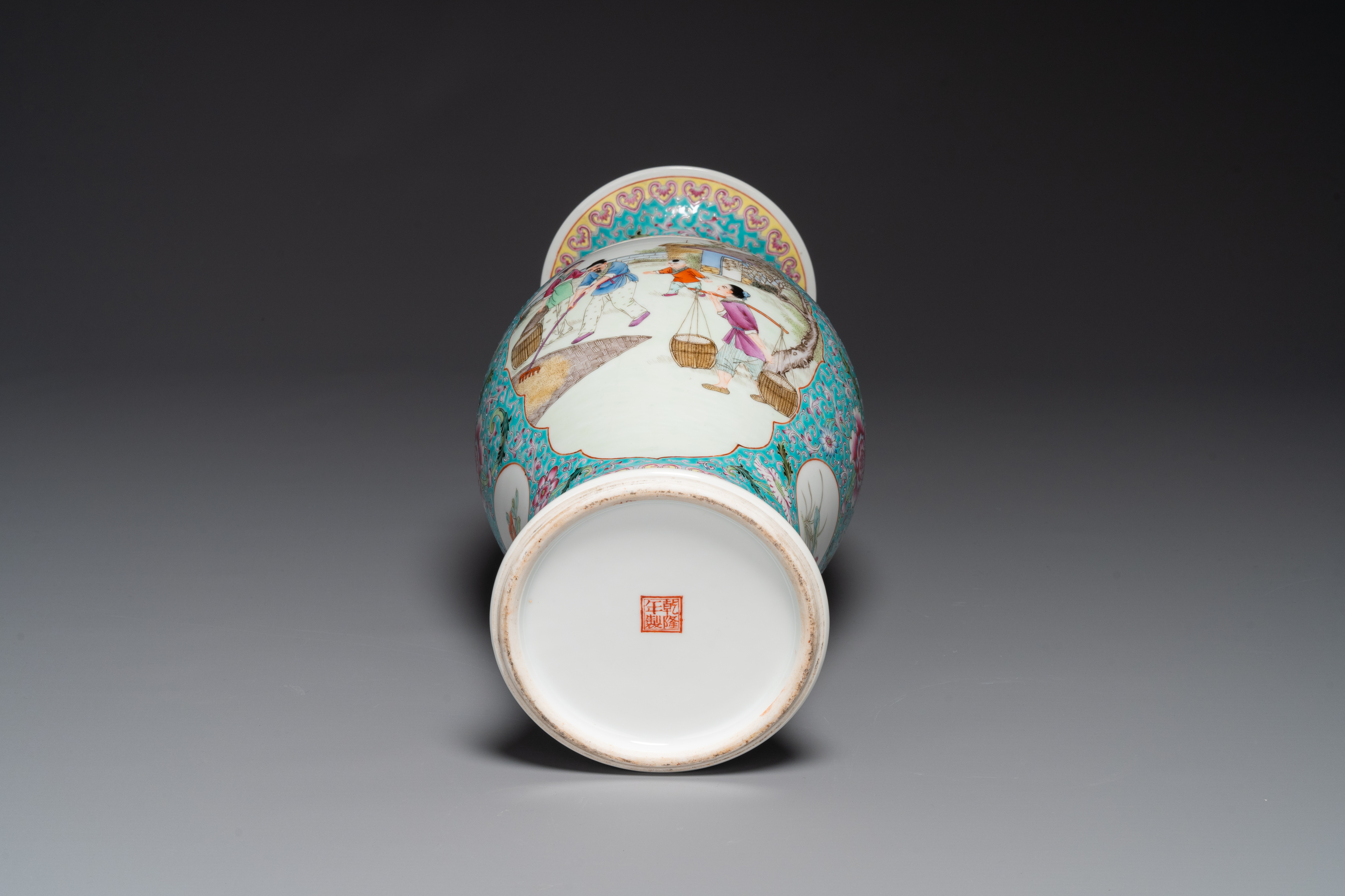 A Chinese famille rose dish with figural design and a 'rice production' vase, Qianlong mark, 20th C. - Image 4 of 4