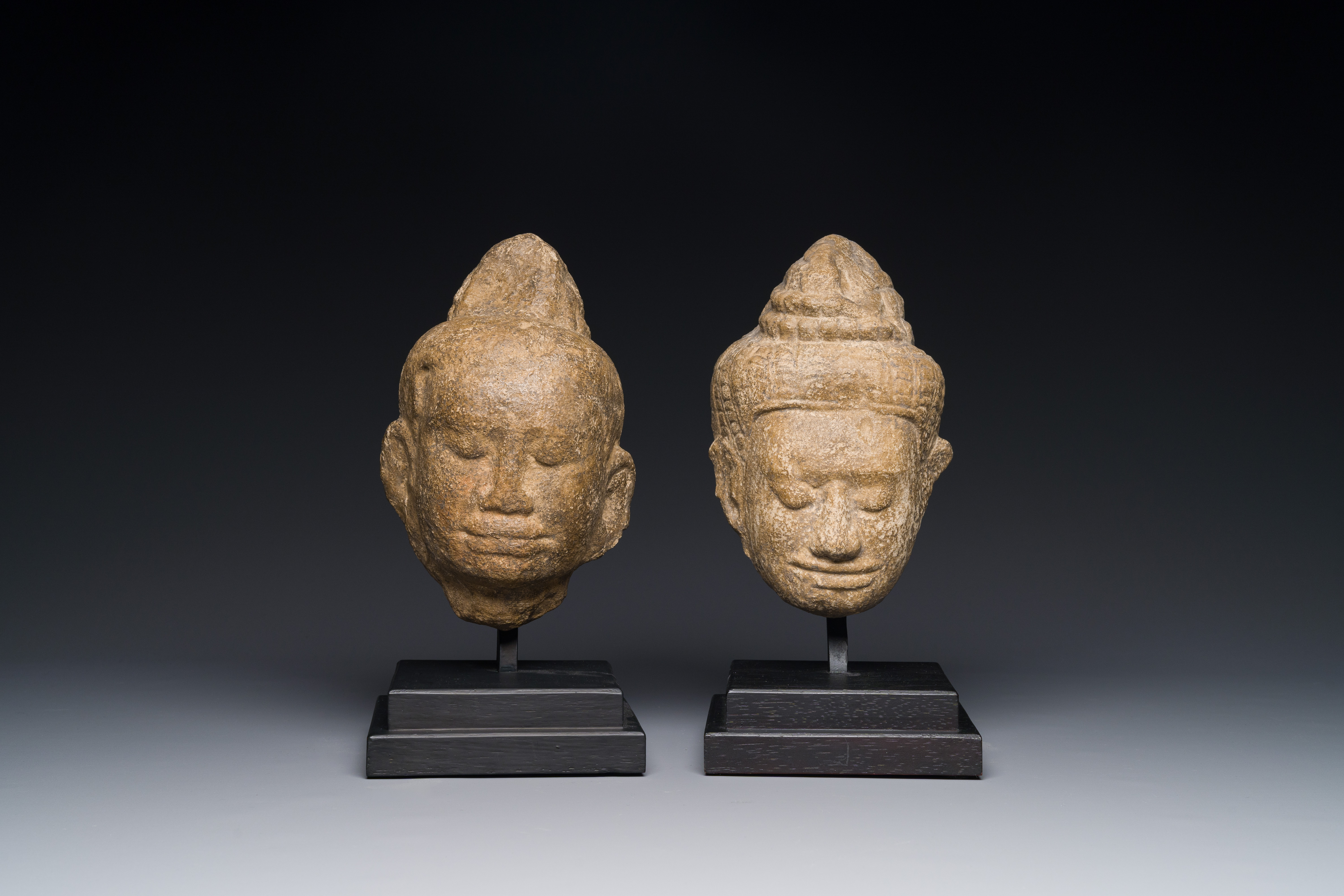 A stone head of Buddha and a sandstone khmer head of a deity, Bayon style, Cambodia, 12/13th C. - Image 4 of 12