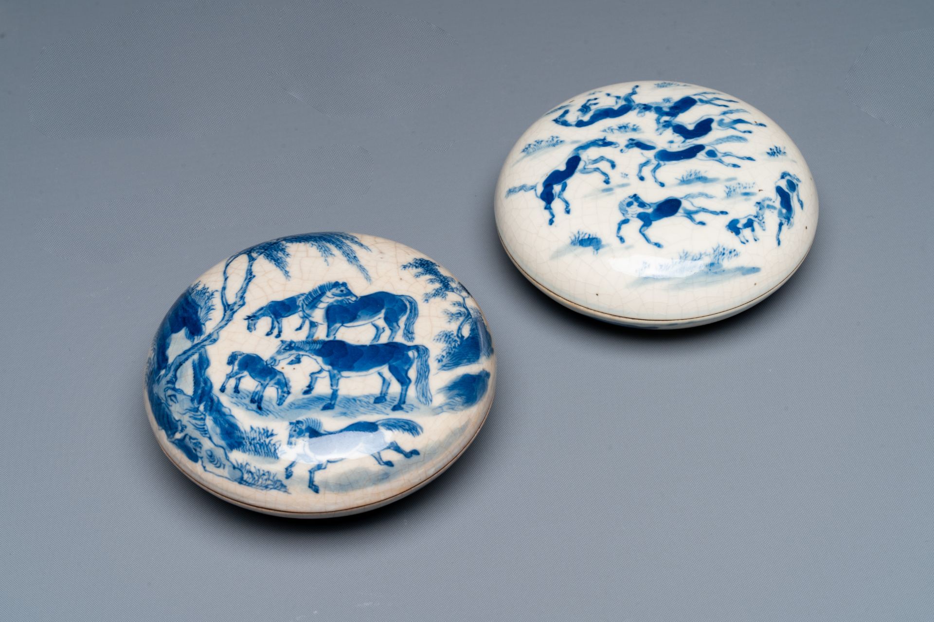 Two Chinese blue and white seal paste boxes and covers, Kangxi and artemisia leaf mark, 19th C.