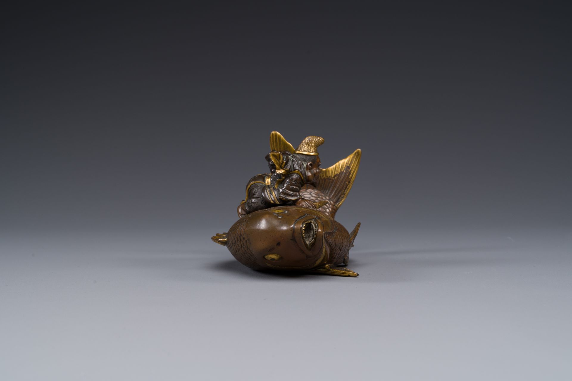 A Japanese partly gilded bronze lidded box in the shape of Ebisu on sea bream, signed Miyao Zo, Meij - Image 5 of 10