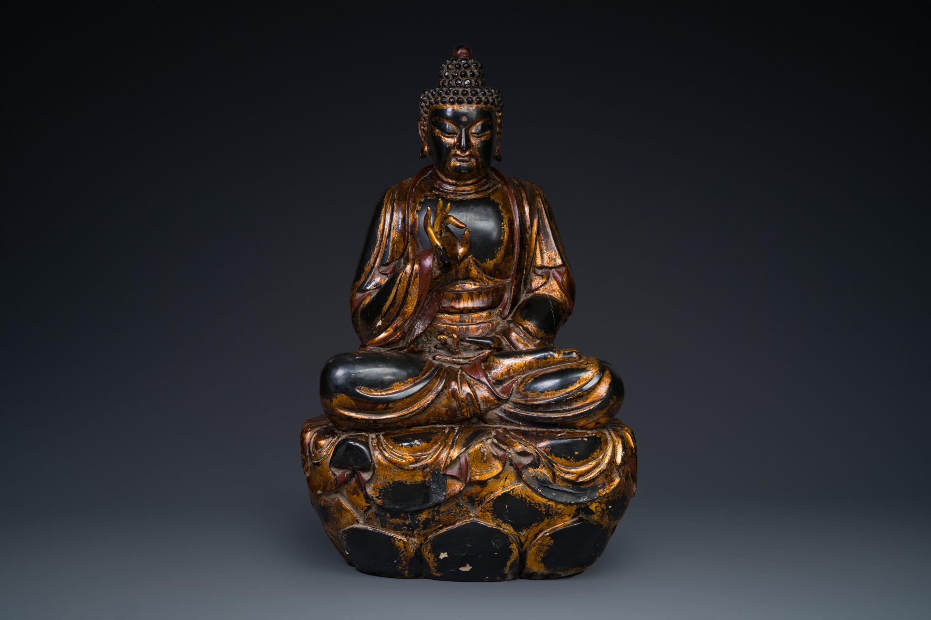 A fine and large Japanese gilt-lacquered wooden sculpture of a Buddha Shaka, Edo