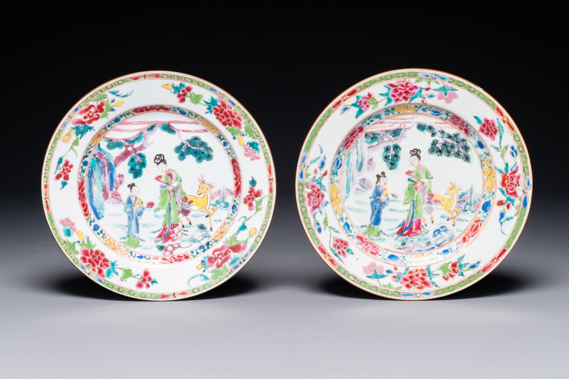 A pair of Chinese famille rose 'Magu' plates, Yongzheng