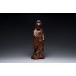 A Chinese partly gilt and lacquered wooden sculpture of Guanyin, Ming