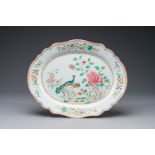 An oval Chinese famille rose dish with birds near blossom branches, Qianlong