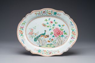 An oval Chinese famille rose dish with birds near blossom branches, Qianlong