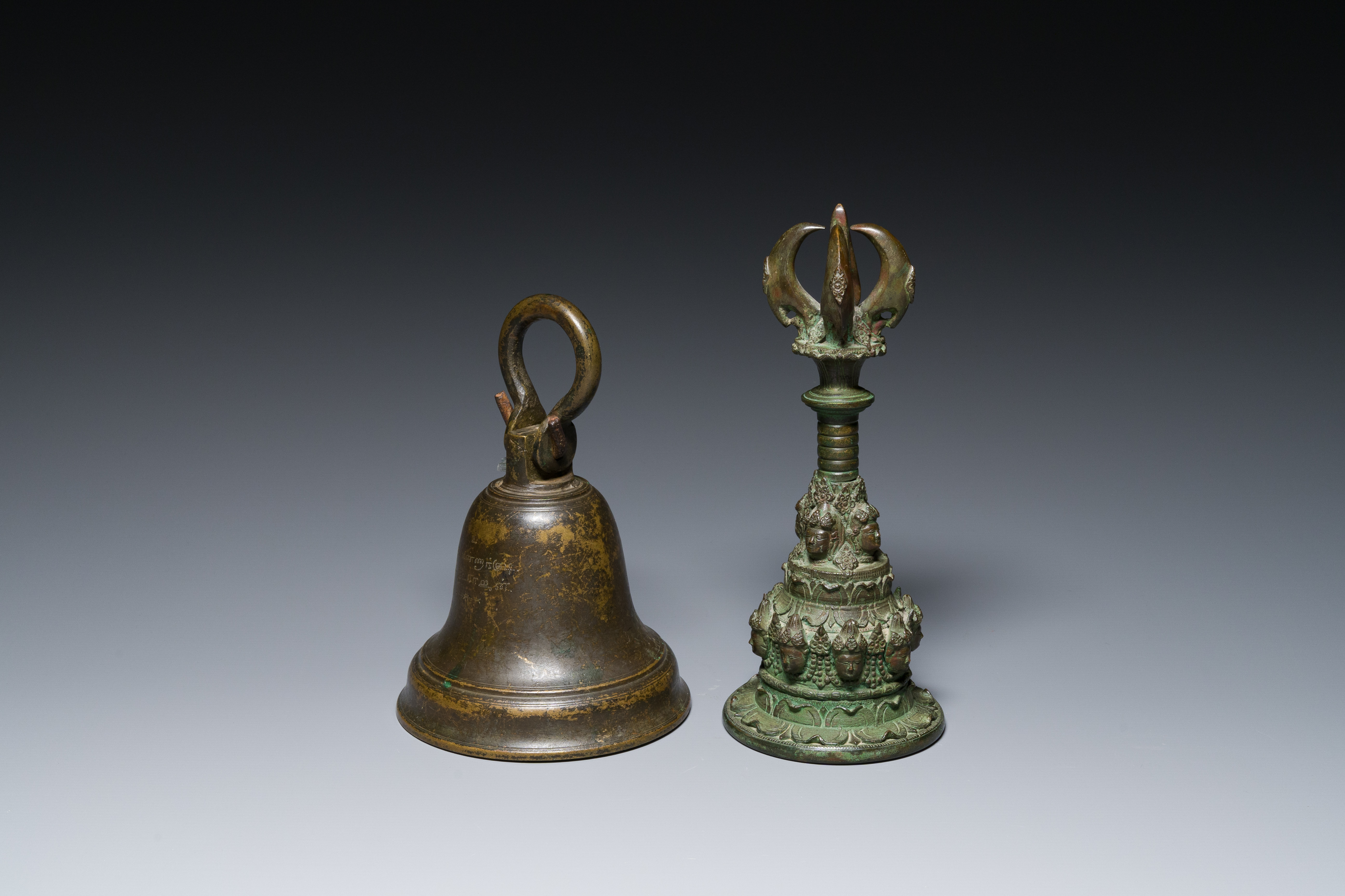 A bronze bell and a ceremonial hand bell, South Asia and Southeast Asia, 19th C. or earlier - Image 2 of 21