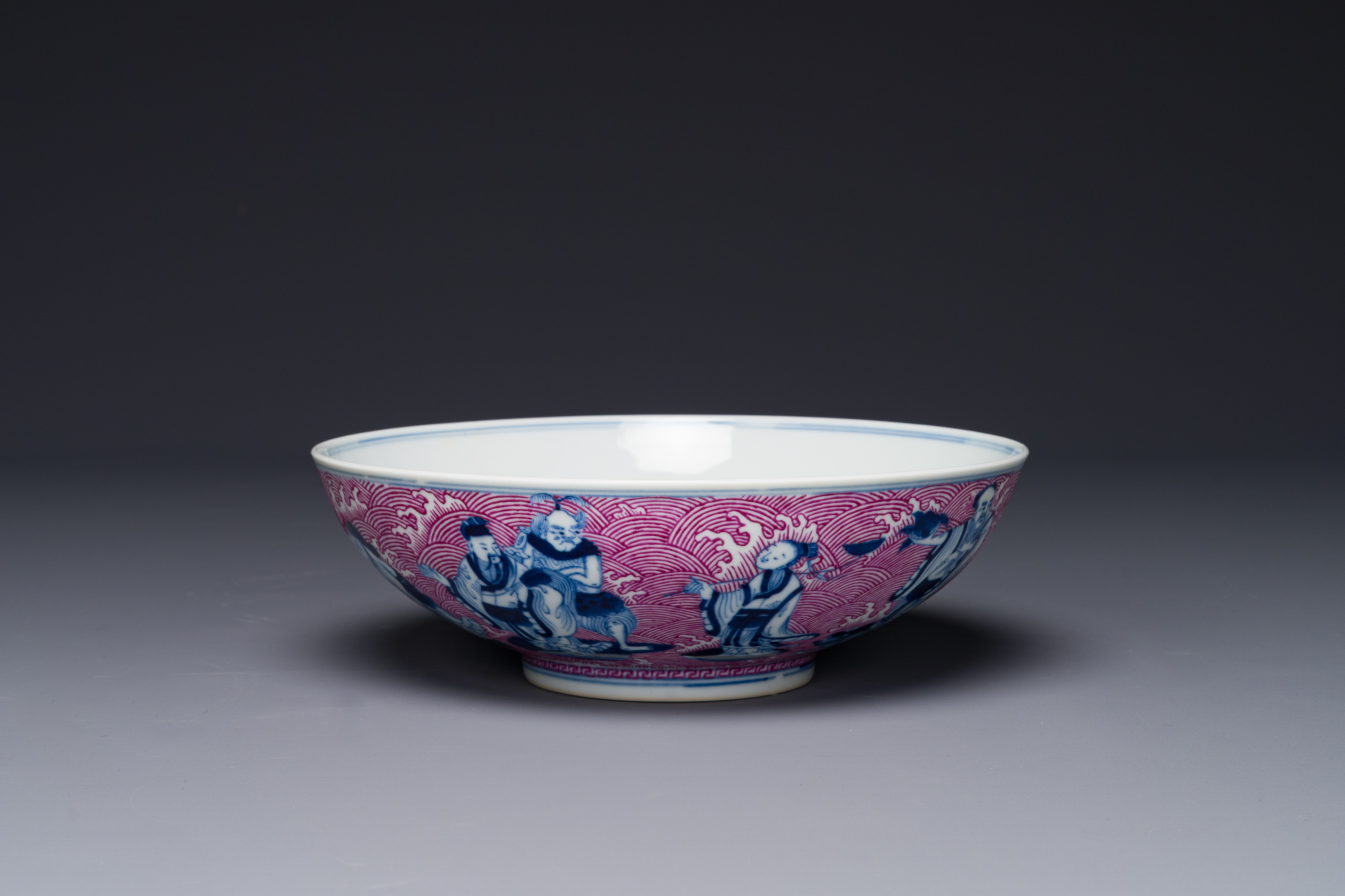 A Chinese blue, white and puce-enamelled 'Eight Immortals' bowl, Guangxu mark and of the period - Image 5 of 8