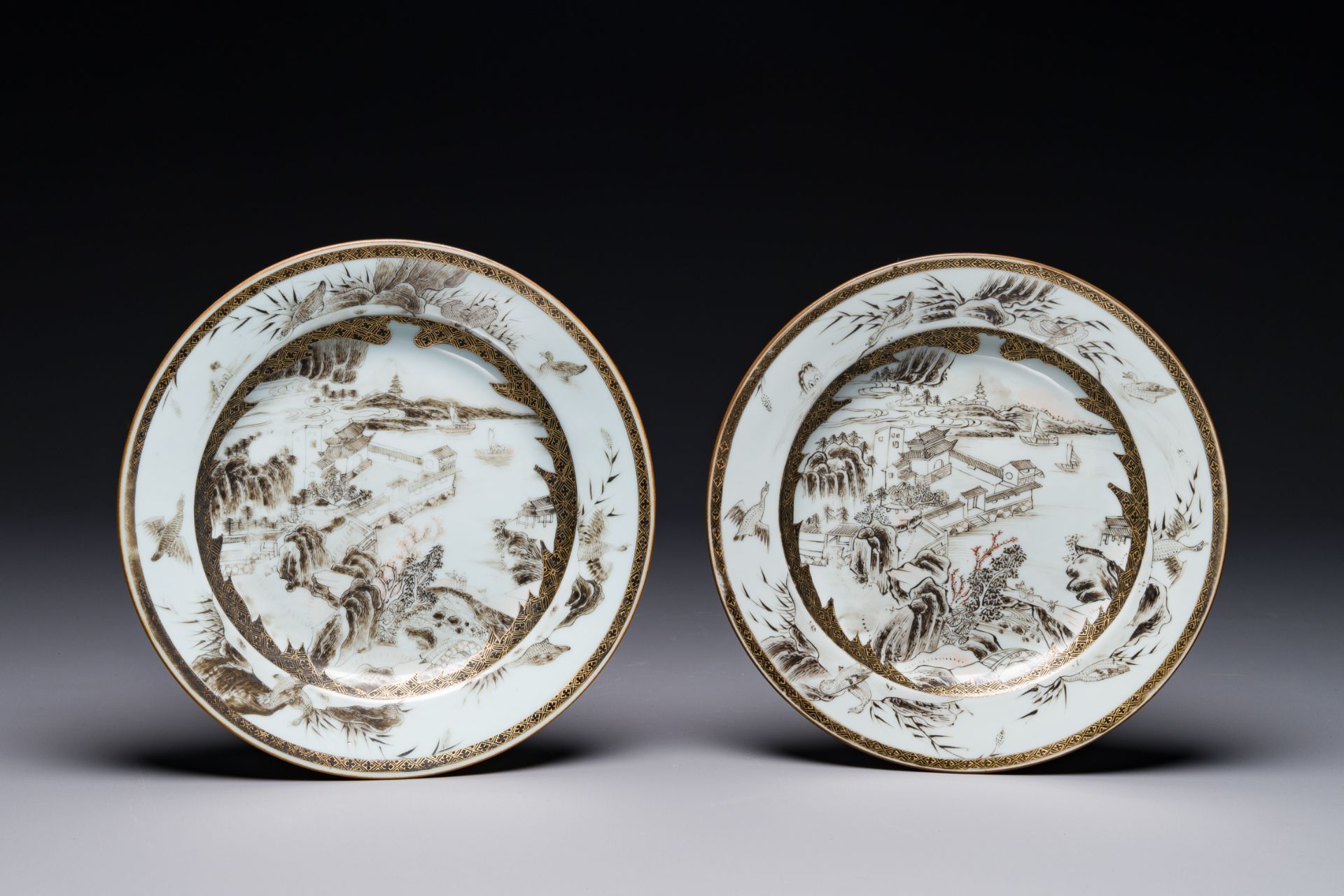 A pair of Chinese grisaille plates depicting the Whampoa Pagoda and the Pearl River, Yongzheng