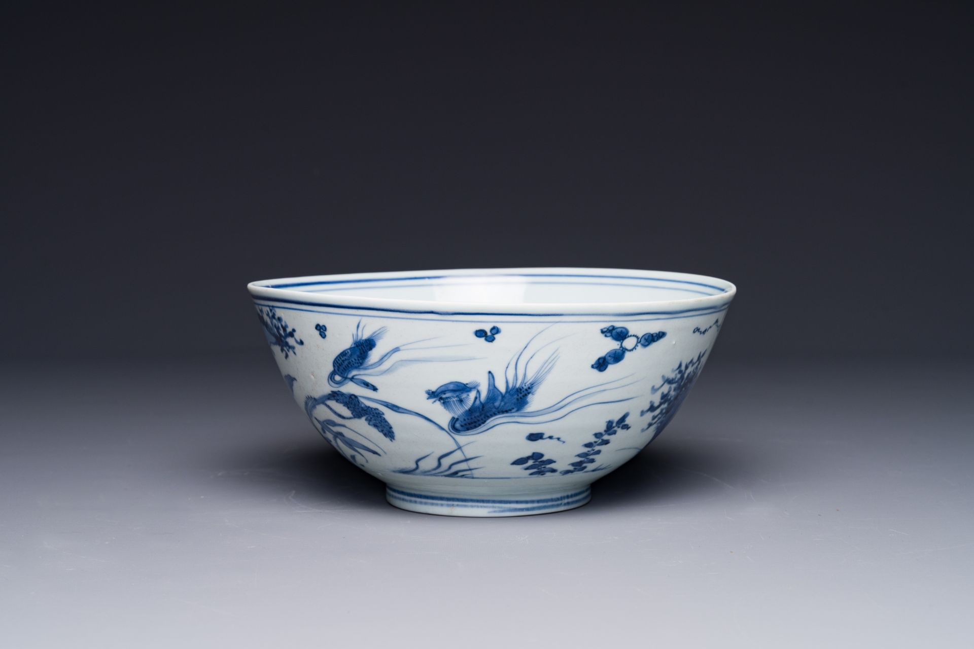 A Chinese blue and white 'mandarin ducks in a lotus pond' bowl, Chenghua mark, Wanli