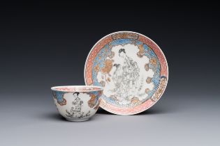 A Chinese famille rose and grisaille 'Xiwangmu receiving a peach' cup and saucer, Yongzheng