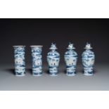 A Chinese blue and white garniture of five vases with landscape design, 19th C.