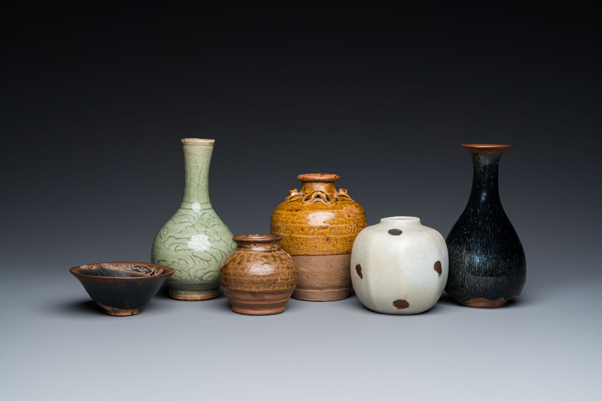 Five various Chinese monochrome-glazed vases and a bowl, Yuan and later