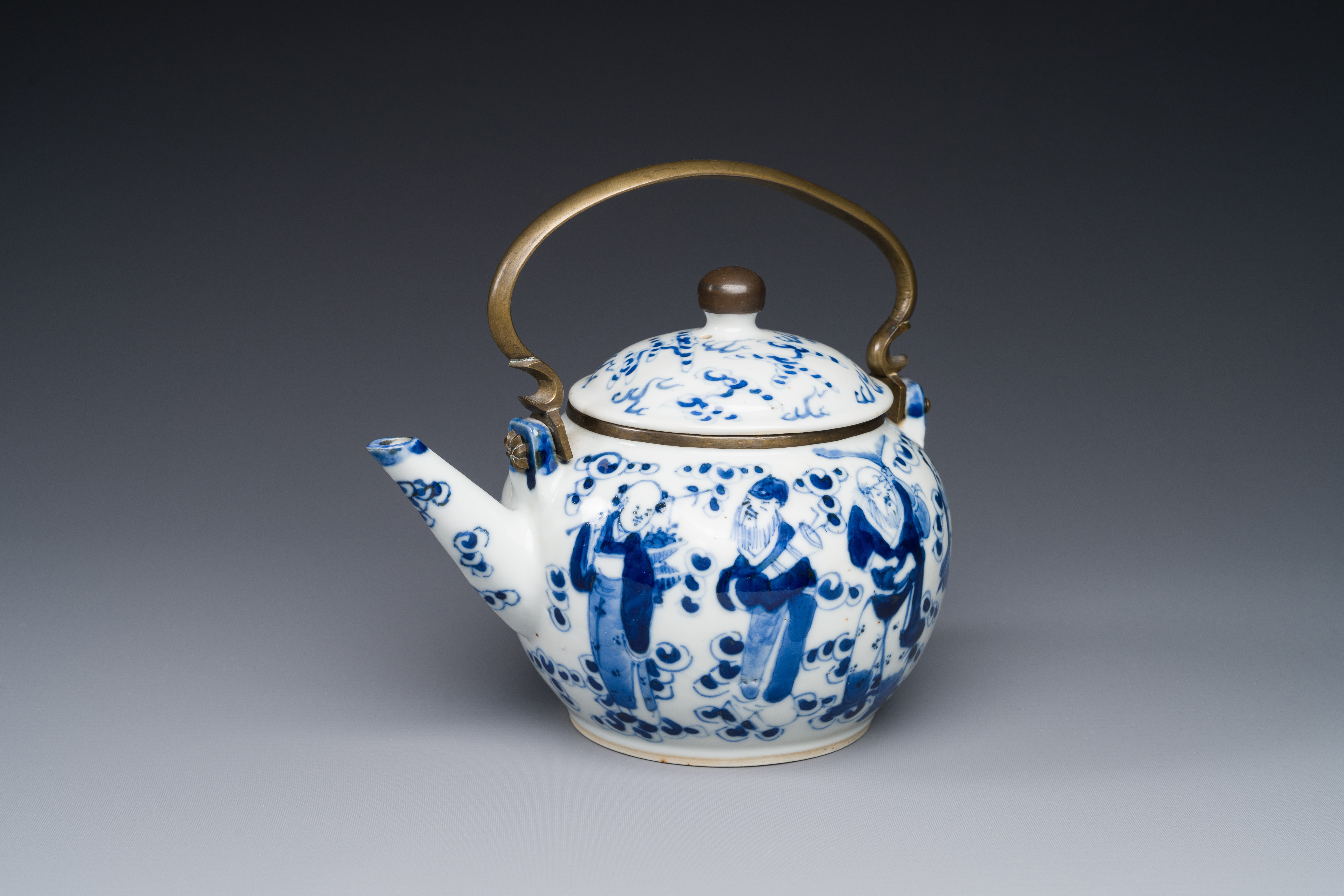 A Chinese blue and white 'Eight Immortals' teapot with bronze mount for the Thai market, Yong Mao Yu